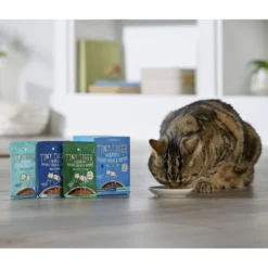 Tiny Tiger Pate Seafood Recipe Grain-Free Canned Cat Food & Tiny Tiger, Lickables, Variety Pack, Bisque Cat Treat & Topper -Furry Feast 652854 PT8. AC SS1800 V1664899673
